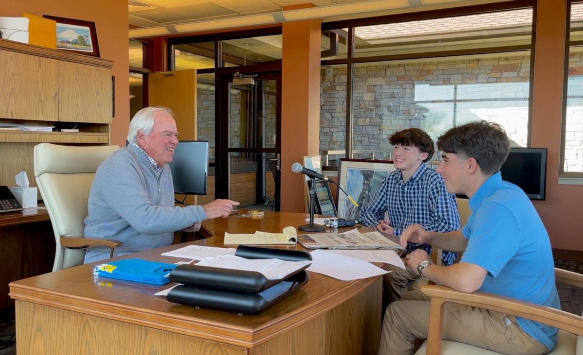 Matt Ross and Collin Fowler interview Craig Culver for their podcast, Hawk Hustle in his office at Culvers headquarters.